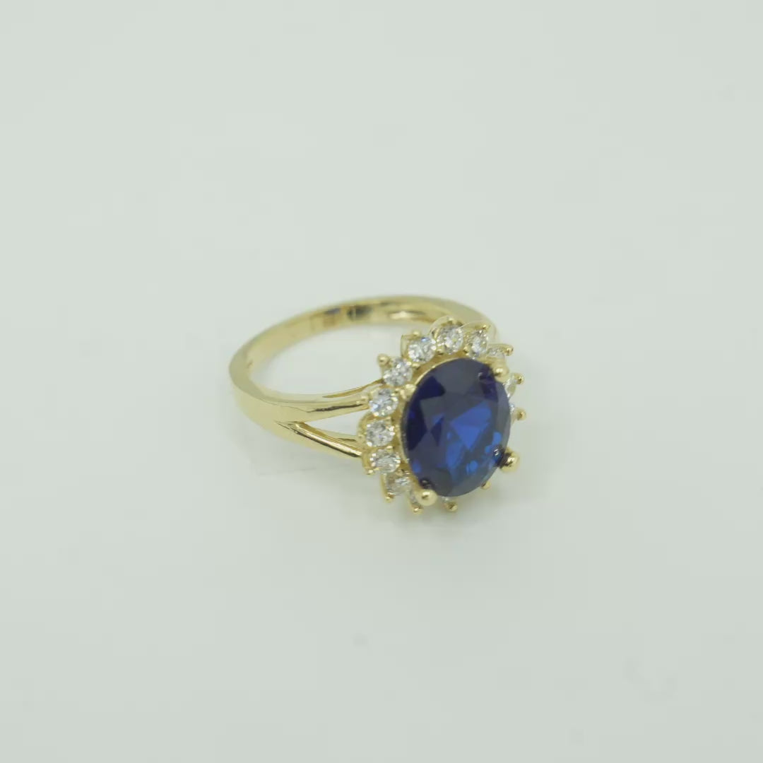 14KT Women's Gold Ring Jumbo Oval Navy Blue Center with Round White CZ Stones Border Plain Split Band