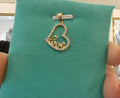 14KT Gold Love in Heart Shaped Pendant